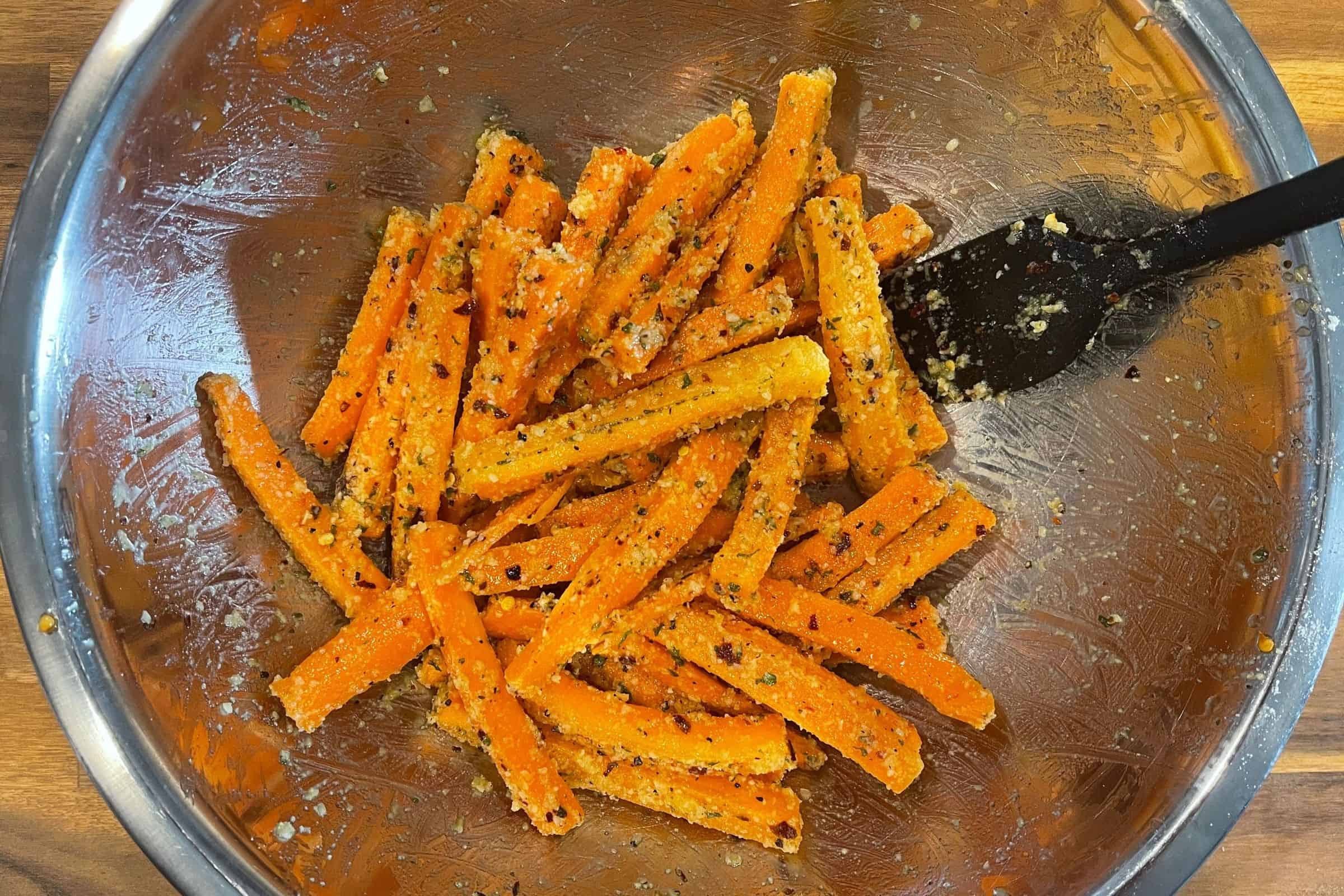 garlic parmesan carrot sticks before baking