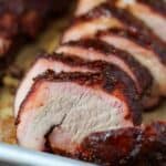 slices of a Mexican pork tenderloin after smoking on a Traeger grill