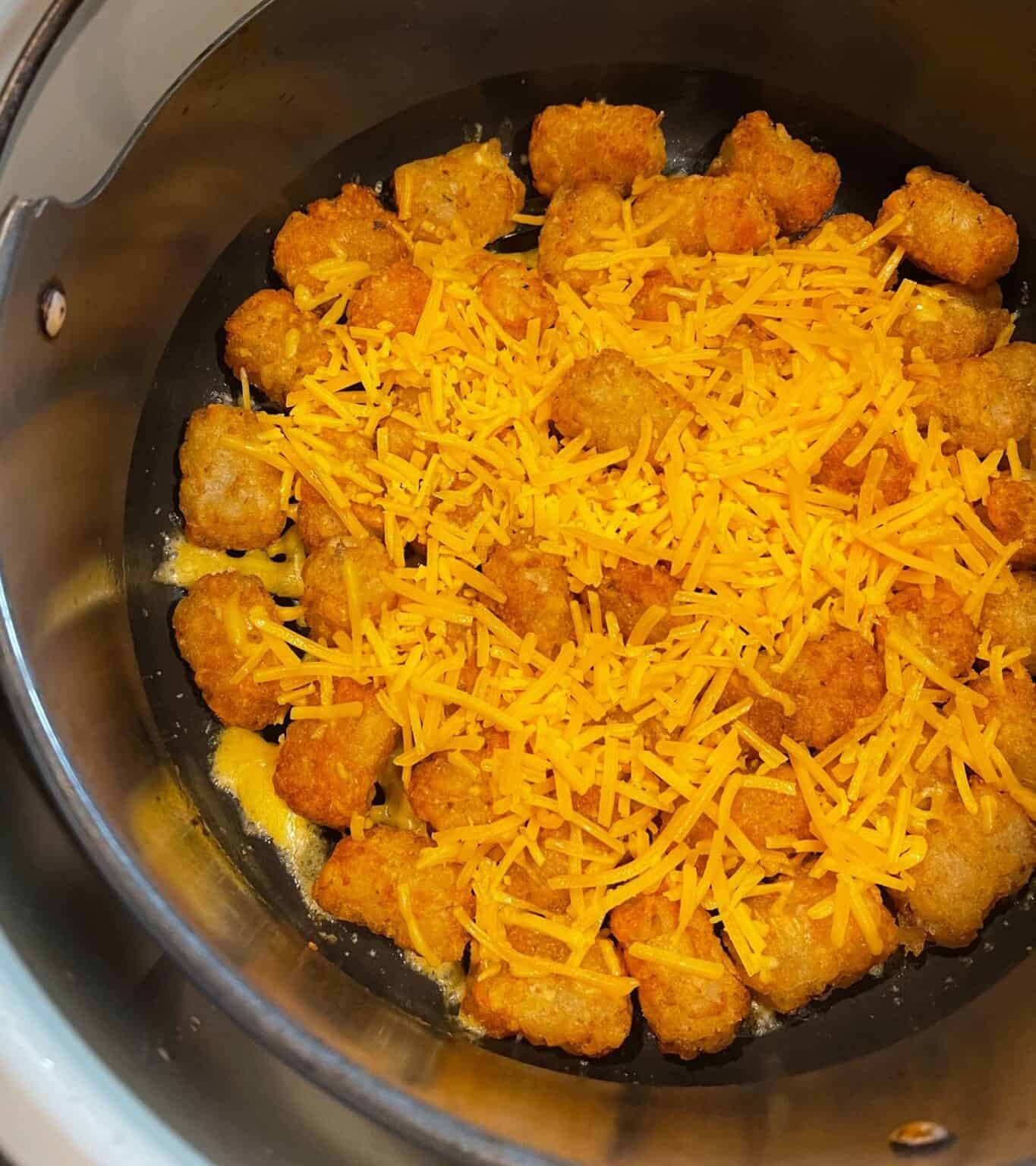 Loaded Air Fryer Frozen Tater Tots with Bacon, Cheddar, and Sour Cream