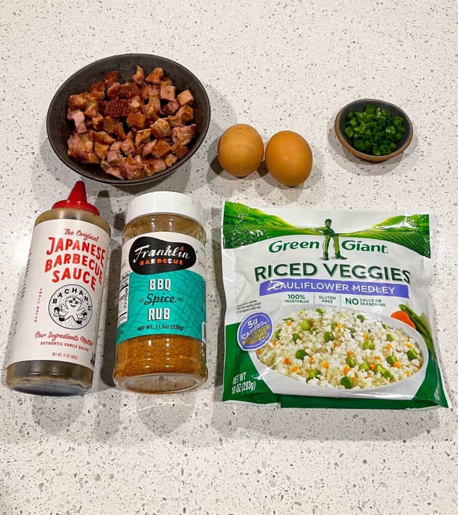 frozen cauliflower rice medley, leftover BBQ pork tenderloin, two eggs, scallions, bbq seasoning, and Japanese BBQ sauce