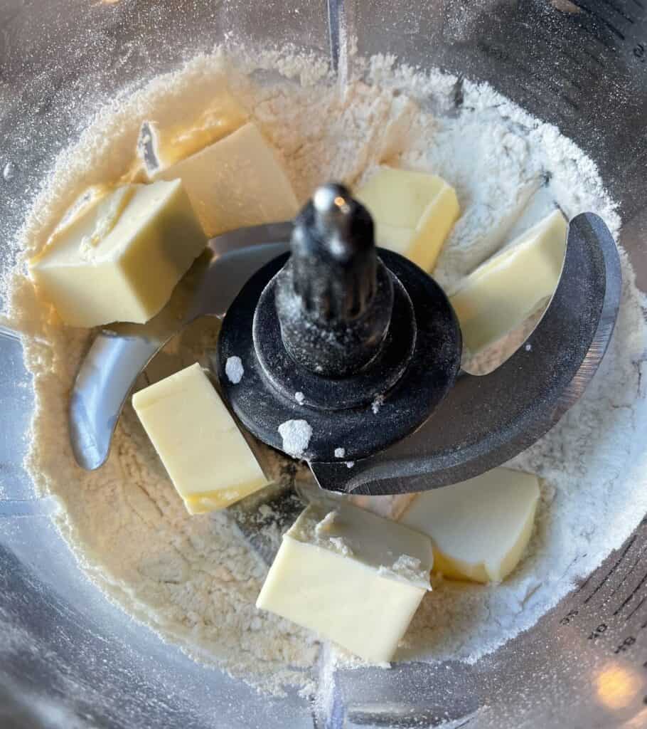 butter, all purpose flour, salt, sugar, baking powder, and baking soda in a food processor