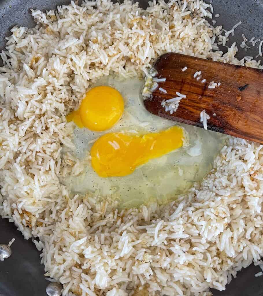 eggs in a center well of fried rice