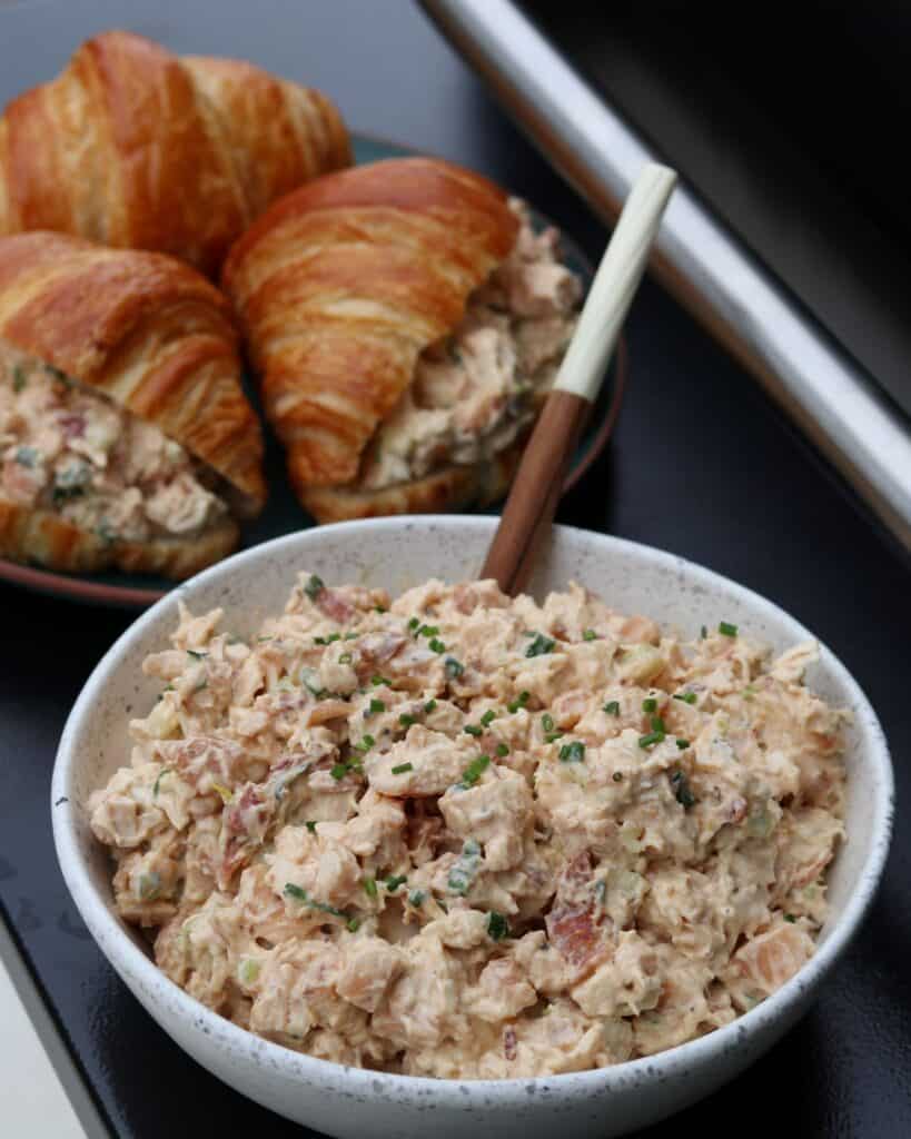 smoked chicken salad in a bowl and on croissants