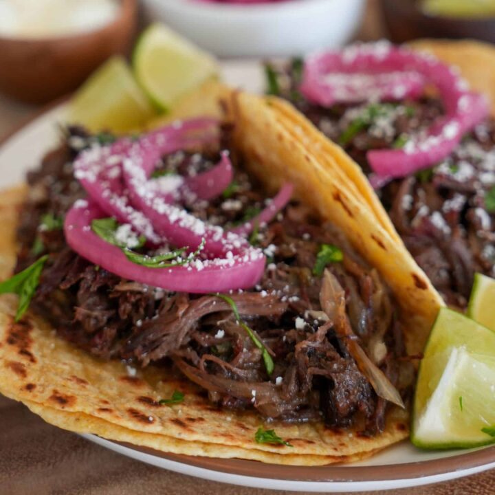 two smoked pulled beef tacos