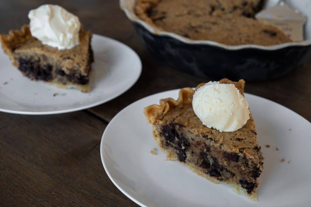 two slices of cookie pie with scoops of ice cream on top