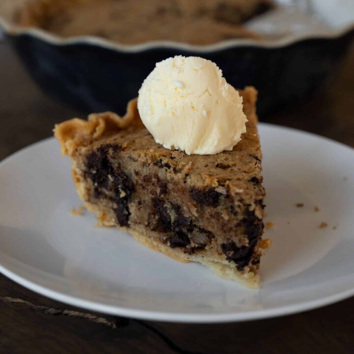 one slice of cookie pie with a scoop of ice cream on top