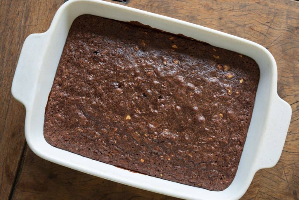 Baked brownies in baking dish.
