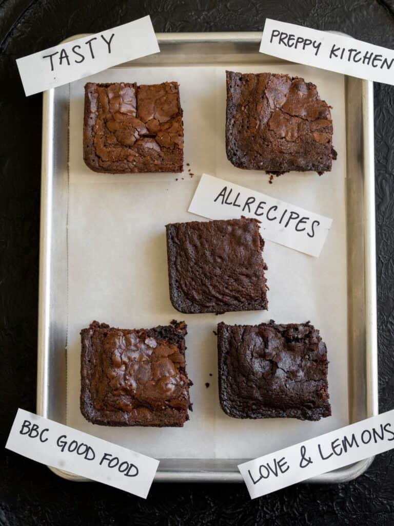 five different slices of brownies on a sheet pan.