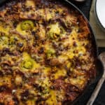ground bison burrito casserole in a cast iron skillet